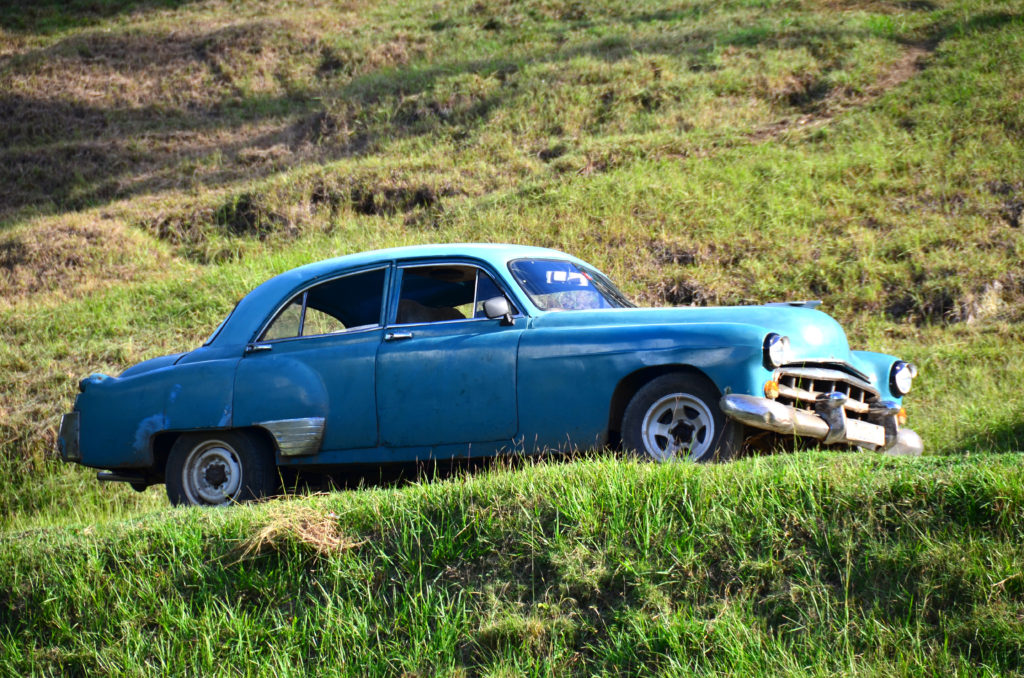 Vintage car drives in Las Terrazas